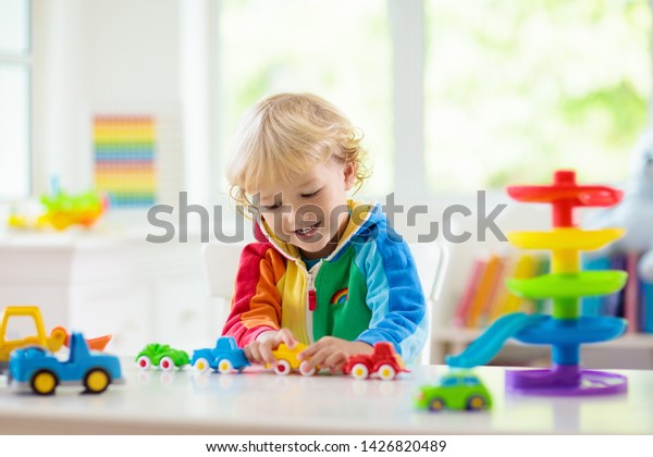 Little Boy Playing Toy Cars Young Stock Photo Edit Now 1426820489