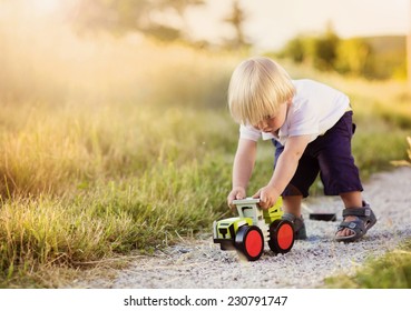 boys playing with trucks