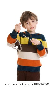 Little Boy Playing A Triangle Instrument Isolated On A White Background