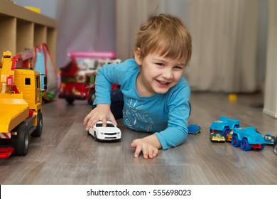 boys playing with cars