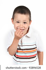 Little Boy Posing With Arms Crossed On White