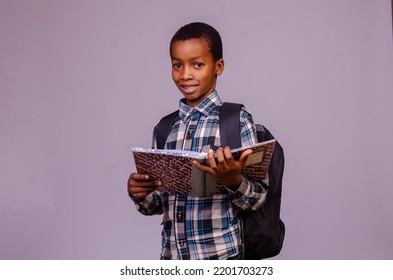 Little boy reading interesting book - Powered by Shutterstock