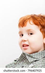 Little Boy With Red Hair In Shirt Looking At Camera With Smile, Close-up, Not Isolated