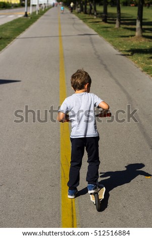 Similar – teenager practicing with skateboard at sunrise city