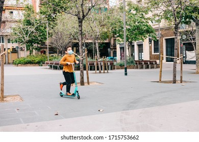 Little Boy With A Scooter And A  Medical Mask