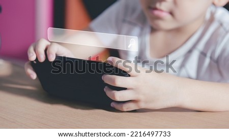 Little boy Search game in the Playstor,boy hands are using a smartphone to Searching for information. Using Search Console with your website.