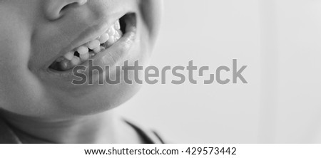 Similar – Crop unrecognizable teenage girl eating healthy walnut kernel