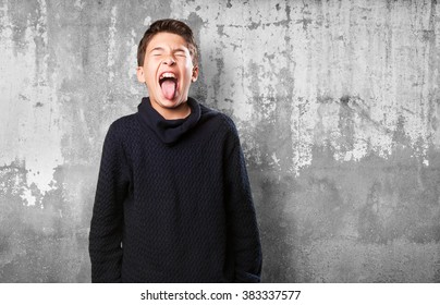 Little Boy Showing Tongue