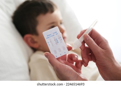A little boy is sick, a combo antigen test (covid-19, flu a b, RSV) is needed for proper diagnosis.