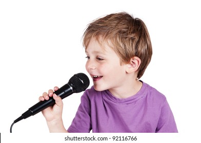 Little boy singing in a studio