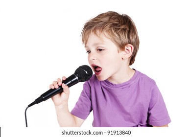 Little boy singing with a white background