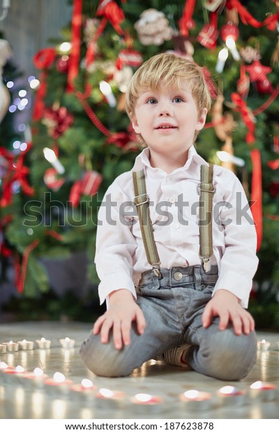 Little Boy Sits On Heels Putting Stock Photo 187623878 