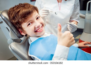 Little boy smiling in the dental office. - Powered by Shutterstock