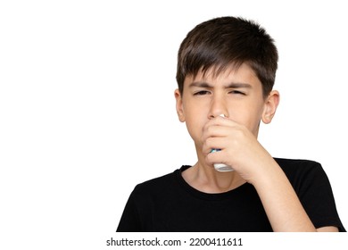 Little Boy Spraying Medicine In Nose, Nose Drops. Little Child Using Nasal Spray. Runny Nose, Cold, Flu, Illness, Virus. Close Up. Isolated On The White Background