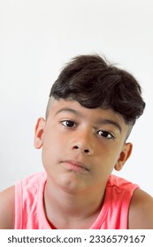 little boy staring at the camera