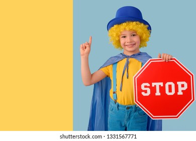 Little boy with a stop sign. Space for text - Shutterstock ID 1331567771
