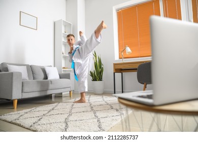 Little Boy Studying Karate Online At Home