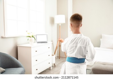 Little Boy Studying Karate Online At Home