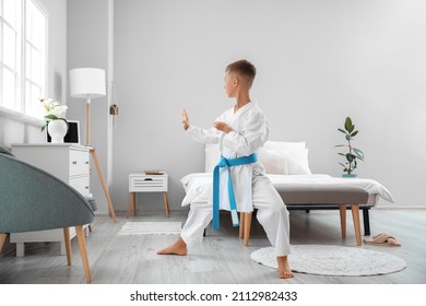 Little Boy Studying Karate Online At Home