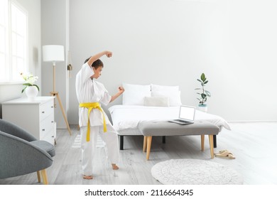 Little Boy Studying Karate Online At Home