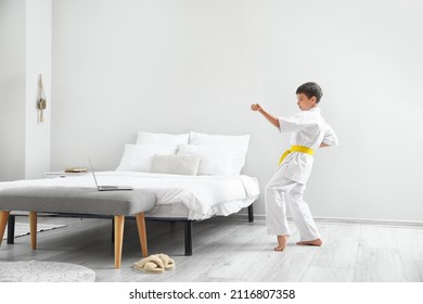 Little Boy Studying Karate Online At Home