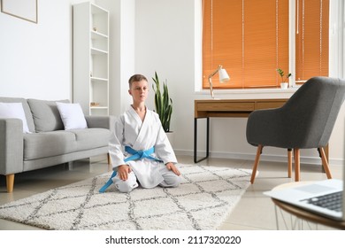 Little Boy Studying Karate Online At Home