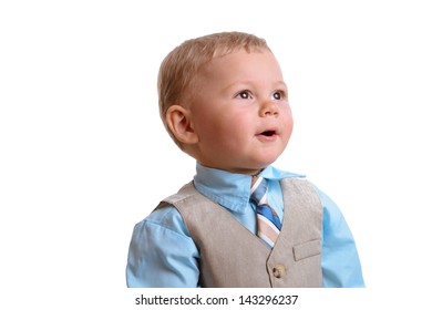 Little Boy In Suit And Tie Surprised