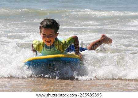 Little boy surfing