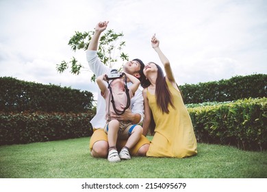 Little Boy Taking Photo With Mom And Dad, Happy Family.