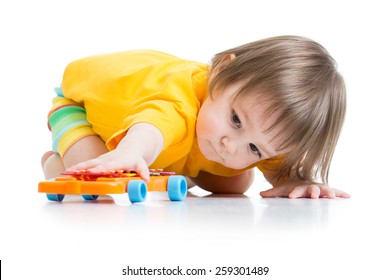 Little Boy Toddler Playing With Toy Car Isolated