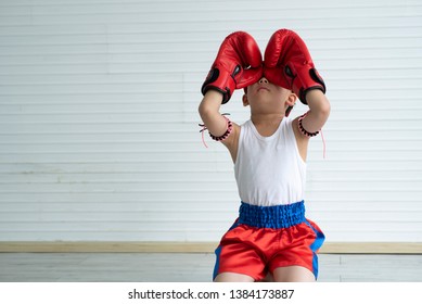 Little Boy Training Muay Thai Athlete