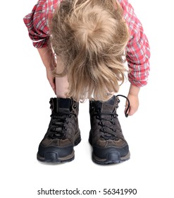 Little Boy Trying His Father's Hiking Shoes Isolated On White