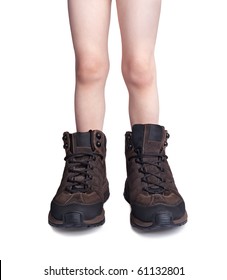 Little Boy Trying His Father's Hiking Shoes Isolated On White