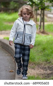 Little Boy Walking On Curb Park Stock Photo 689905603 | Shutterstock