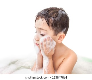 Little Boy Washing Face In The Bathroom