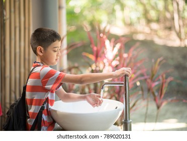 Little Boy Washing His Hands 