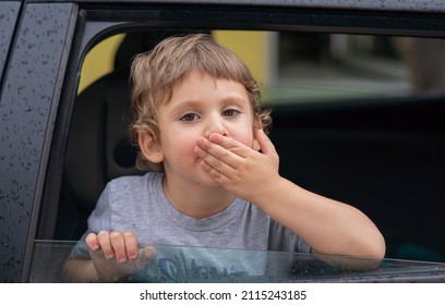 Little Boy Waving Through The Car Window, Goodbye Kiss