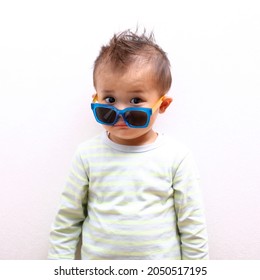 Little Boy Wearing Blue Sunglasses 