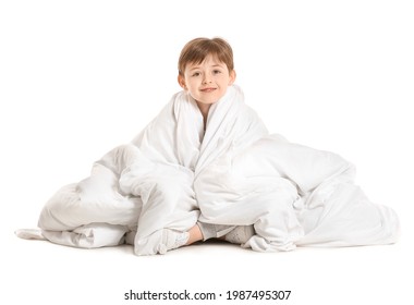 Little Boy Wrapped In Blanket On White Background