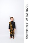 Little boys wear various kinds of regional traditional clothes in Indonesia
