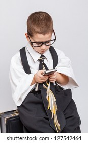 Little Business Man Using Mobile Smart Phone