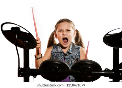 Little Caucasian Girl Drummer Playing The Elettronic Drum Kit And Shuoting, Emotional Portrait On Black Background. Close-up Photo On White Background