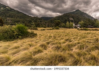 Little Chapel In The Lanín National Park, Located Near The Huechulaufquen Lake, In A Cloudy Day.