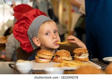 
Little Chef Eating French Fries