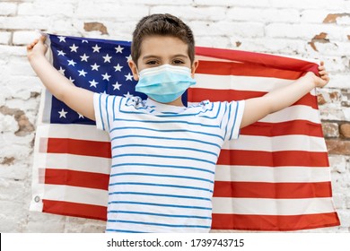 Little Child With American Flag And Face Mask