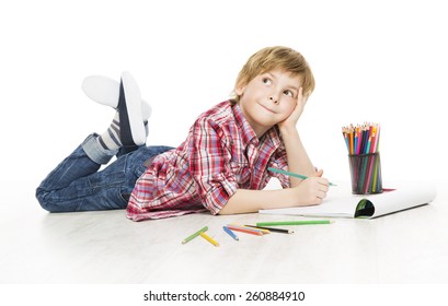 Little Child Boy Drawing by Pencil, Artistic Creative Kid Thinking and Dreaming Idea, Creativity Early Education Concept - Powered by Shutterstock