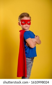 Little Child Boy Play Superhero. Happy Smiling Kid In Glasses With Star. Success, Motivation Concept. 