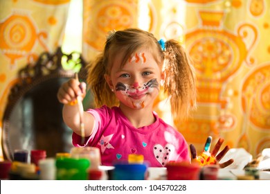 Little Child, Drawing Paint With Paint Of Face.