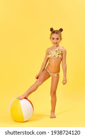 Little Child Girl With Colorful Beach Ball