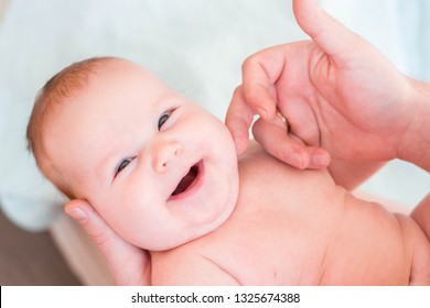 Little Child, The Girl Lies In The Hands Of Her Father. The Child Has Excess Weight And Fat Folds, Requires Dietary Nutrition. The Girl Laughs And Rejoices In Life. Dad Caresses Baby, Tickle Her Cheek